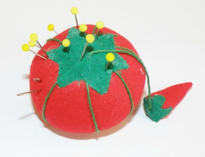 Novelty pincushions like this tomato have become popular