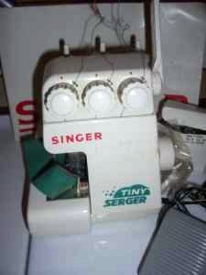 Singer Tiny Serger, Singer TS380 serger sewing machine. Singer Tiny Serger, Singer TS380 serger sewing machine.